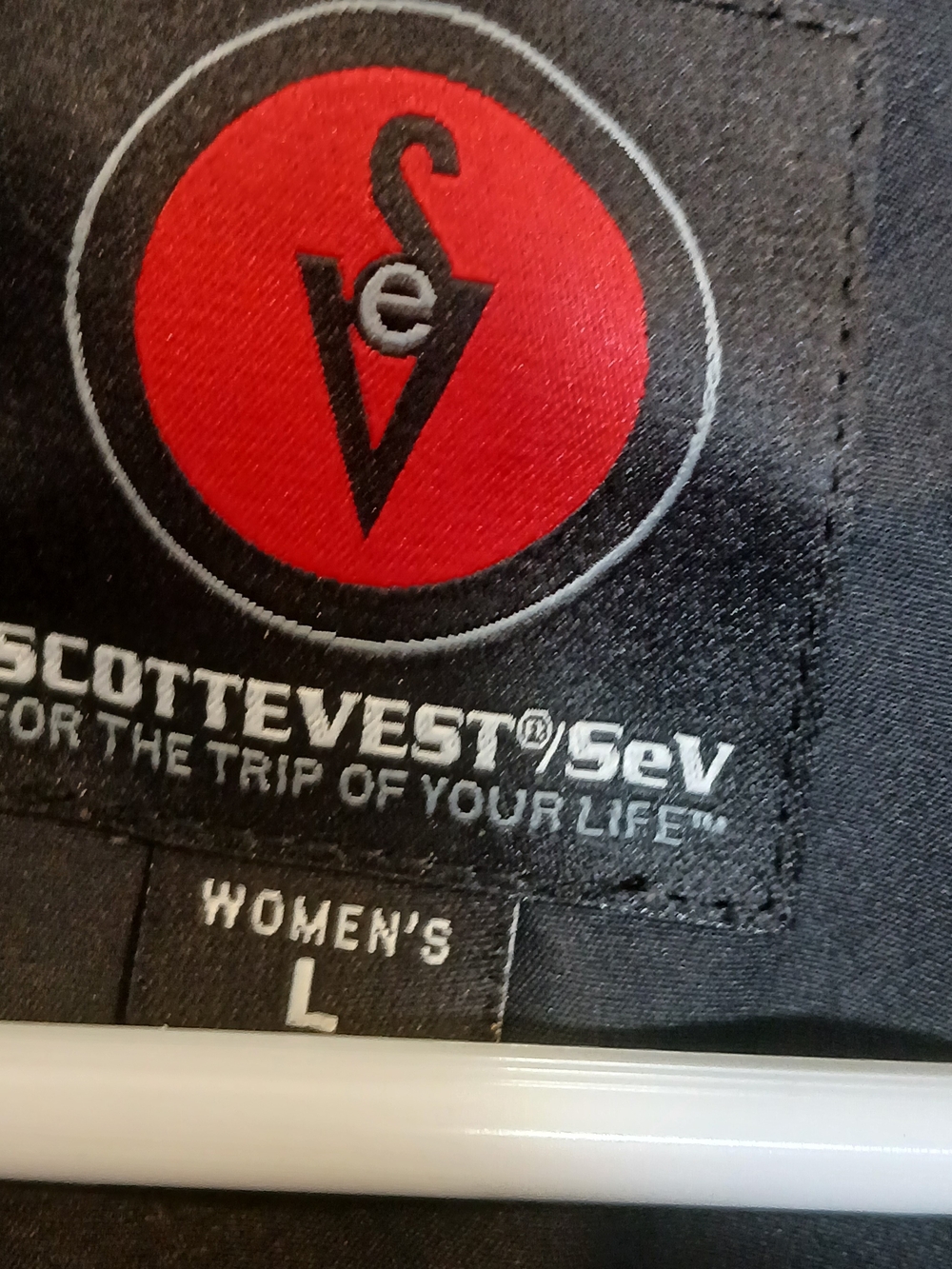 black SCOTTeVEST utility travel vest featuring a full-zip front READ - Picture 2 of 10